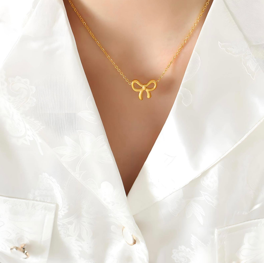 18K Gold Plated Steel “Bow” Necklace